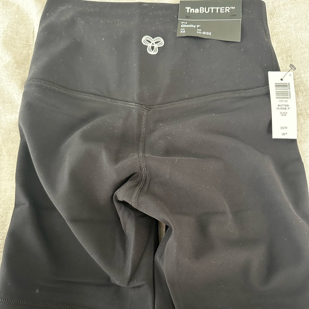 Tna butter ckeeky 7” high rise bike/ workout shorts